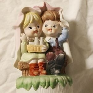 Vintage hummel like music box figurine